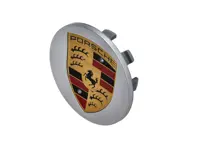 Radkappe mit farbigem Porsche Wappen, in Silber. Porsche Macan - 95B601150A88Z, 95B601150A
