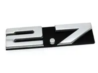2.7 - Badge pour grille de ventilation arrière. Porsche 911 1973-74 - 91155901503, 91155901501