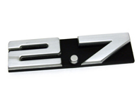 2.7 - Badge for rear ventilation grille. Porsche 911 1973-74 - 91155901503, 91155901501