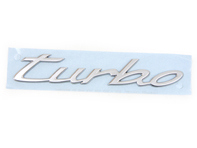 'Turbo' rear lid badge, light silver metallic. Porsche Taycan - 9J1853675COU2, 9J1853675C